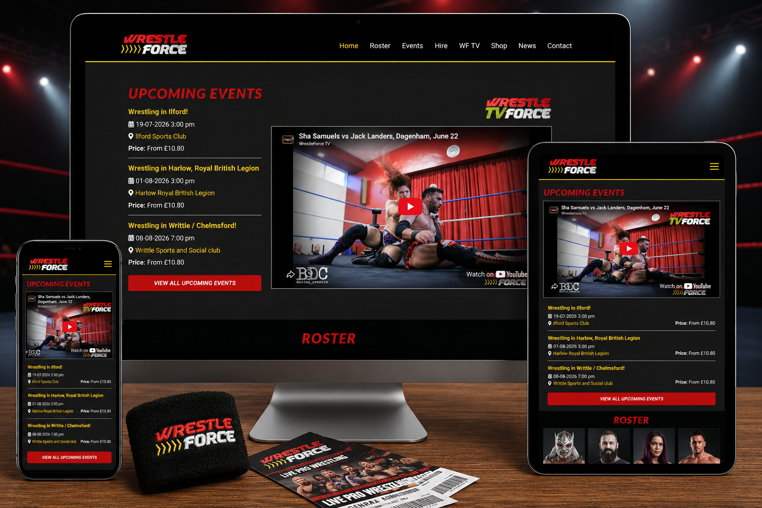 Wrestle Force responsive website displayed on a desktop computer with a professional wrestling arena background.